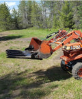 Clamp On Debris Forks For 48 Inch Loader Buckets 21 Inch Fork Length Skid Steers Compatible Beefy Cleanup Tool with tractor on site.