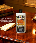 Kitchen Cabinet Creme Cleaner And Grease Remover For Wood Surfaces, No Fuss 16 Oz Restores Finish And Removes Grease Stains bottle on table