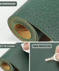 Close-up of waterproof dark green Beefy Dual Sided Cork And PU Leather Desk Pad 47 Inch By 17 Inch with cleaning and protection features.