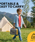 Child holding Portable Power Station With 300W Solar Generator And Two 110V Pure Sine Wave Outlets 296Wh Pack in a scenic camping area.