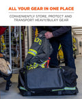 Person placing gear into Arsenal 5008 Firefighter Turnout Gear And Safety Duffel Bag With 1000D Polyester Exterior Black