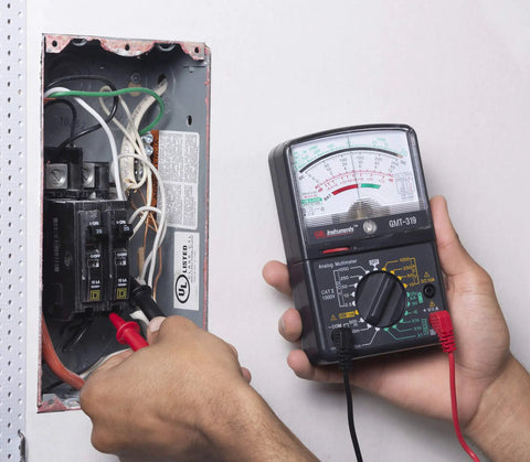 Testing electrical panel with GMT 319 Multimeter Tester For Electric Pros And DIYers, RJ45 And RJ11 Ports, 7 Functions And 19 Ranges.