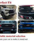 Front view of Chevy Colorado GMC Canyon with red tow hook covers installed, showcasing perfect fit and factory style.