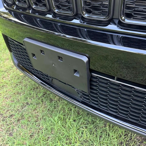 Front Bumper License Plate Frame Bracket Tag Holder For 2022 2023 2024 Jeep Grand Cherokee grass background