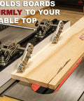 Stainless Steel Table Saw Stock Guides And Anti Kickback Rollers holding a wood board firmly during cutting process.