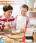 Mother and child baking using Complete Sourdough Starter Jar Kit 35 Oz Large Glass Jar With Date Marked Feeding Band