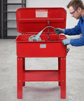 Heavy Duty 20 Gallon Portable Cabinet Parts Washer With Electric Solvent Pump being used by a mechanic, cleaning gear components.