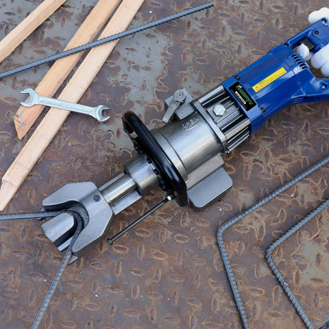 Huanyu 900W Electric Rebar Bender Heavy Duty Hydraulic Steel Rod Bending Machine For Construction on a work surface with tools.
