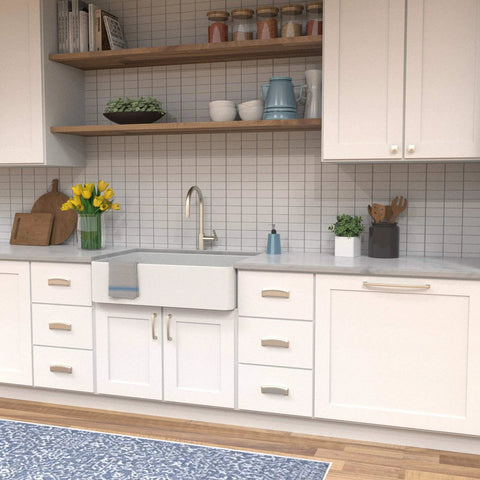 Modern kitchen with white cabinets featuring Solid Core Kitchen Cabinet Pulls in Satin Nickel 12 Inch Hole Center Bridges Collection.
