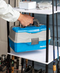 Man placing tackle box on Garage Fishing Pole Organizer That Holds Ten Rods, Reels, Tackle Box, And Gear With Built In Shelves