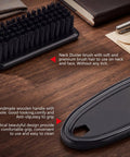 Neck duster brush with wooden handle on table, detailed view of bristles and handle design