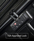 Luggage close-up of black polycarbonate case with TSA-approved lock and zipper pulls