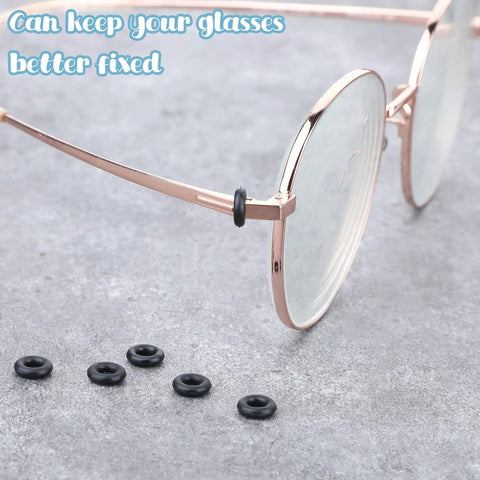 Six Piece Eyeglass Repair Kit With Glasses Temple Grips And Silicone Hinge Tighteners To Give Your Specs A Solid No Sweat Grip Plus Compact Screwdrivers For A Breeze Quick Fix That Works Like A Charm All Day showing eyeglass temple grips and silicone inserts.