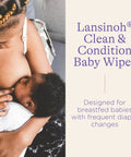 Mother breastfeeding baby with Lansinoh Clean & Condition Baby Wipes packaging visible, ideal for diaper changes and sensitive skin.