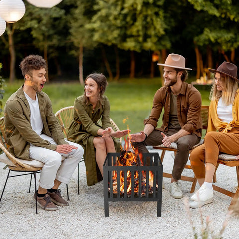 Friends gather around a Square 16x16 Inch Fire Pit For Backyard Parties And Camping, Durable 1.2mm Metal Outdoor Bonfire Pit, Portable And Easy