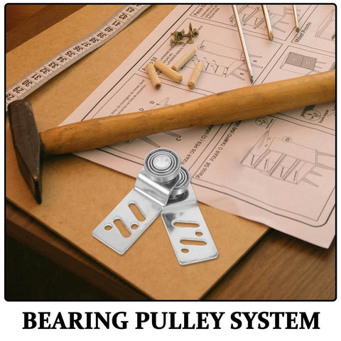 Stainless Steel Sliding Door Pulley With Ball Bearings 23mm Axle Diameter Heavy Duty Bearing Pulley For Industrial And Warehouse Use Workhorse Grade For Garage Doors Closets And Security Doors 1 Pair on a workbench with tools.