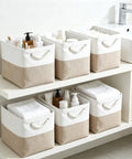 Heavy Duty Foldable Linen Storage Cubes 6 Pack with towels and toiletries in a bathroom shelf organization.