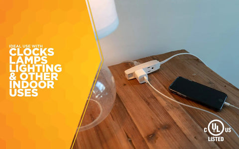 Slimline Flat Plug Extension Cord 6 Foot 16 Gauge 3 Conductor 3 Outlet Indoor White Wall Saver on wooden table with devices