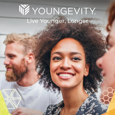 Group of three people smiling with Youngevity branding and slogan "Live Younger, Longer" visible above.