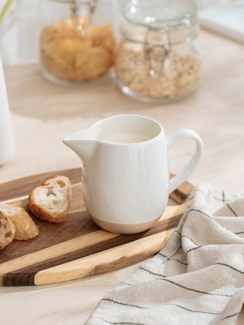 13oz Creamer With Handle Ceramic Pitcher For Coffee, Milk, Syrup And Sauce, Multipurpose Stoneware Jug on a kitchen counter