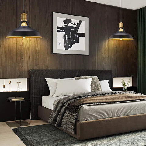 Bedroom setting with Industrial Farmhouse Pendant Light Three Pack With Oil Rubbed Black Finish over a bed, adjustable height evident.