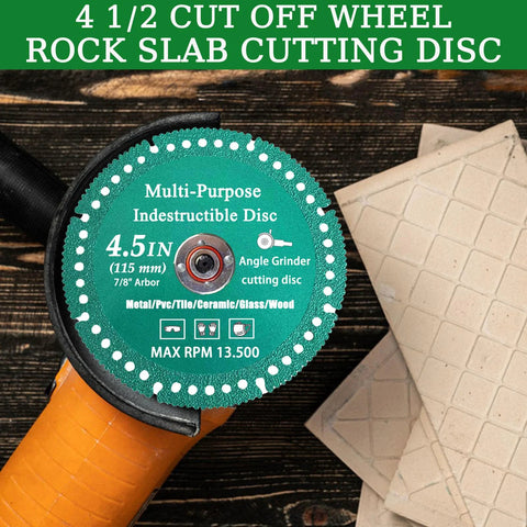Close-up of diamond cutting disc for grinder, 4.5-inch, 7/8 in arbor, mounted on orange angle grinder beside ceramic tiles.