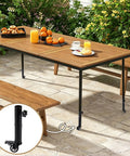 Top Tier Heavy Duty Table Leg Extenders With Casters Four Pack Adjustable Height Risers on outdoor table setup with food.
