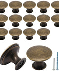Antique Brass Round Cabinet Knobs 16 Pack For Kitchen Cabinets And Dressers With Single Hole Cupboard Door Knobs And Mounting Screws Included 1.14 Inch Diameter And 0.83 Inch Height For Modern Classic Cabinet Makeover, showing all knobs and screws.