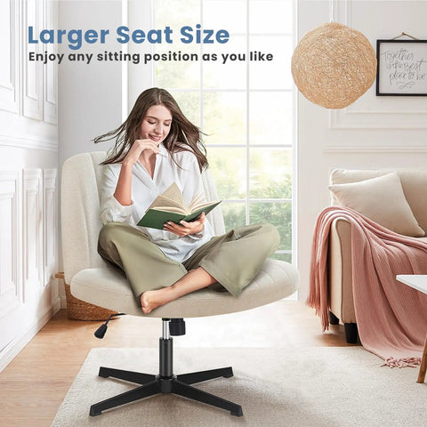 Woman sitting cross-legged reading on Armless Swivel Desk Chair No Wheels With Wide Seat For Home Office And Vanity Comfy Criss Cross Design For Cross Legged Sitting Adjustable Height Sturdy Beige For Computer Tasks