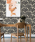 Dining area with Novogratz Zebra Black Feather Palm Removable Peel And Stick Wallpaper For Easy DIY Accent Walls Off White Background Modern Tropical Vibe No Mess Install Made In The USA on walls and wooden chairs visible.
