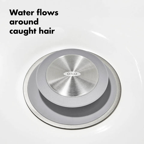 Stainless Steel Hair Catch Drain Protector With Two-Piece Design And Flexible Silicone Cone No-Fuss Easy-Clean Topper in use.