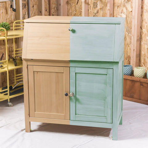 Two-tone cabinet with half painted using Serenity Blue Chalked All In One Furniture Paint With Ultra Matte Finish For DIYers One Coat Coverage No Primer Or Sanding Needed No Topcoat Required Easy Clean Up Made In USA 30 Oz.