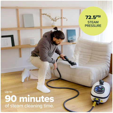 Heavy Duty Commercial Steam Cleaner With Slick Storage Bag Delivers Consistent Low Moisture Dry Vapor For Kick Ass Janitorial Hospitality And Auto Detailing Jobs At Any Venue in use, cleaning a sofa.