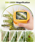 1000X Handheld Digital Microscope for Kids with 2MP Camera and Manual Focus Pocket STEM Toy, yellow handheld microscope showing insect close-up