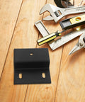 Rock Solid Z Shaped Shelf Brackets For Cabinets And Bathrooms with tools on wooden background