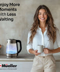 Woman in kitchen with Rapid Boil Electric Tea Kettle 1.8L With Borosilicate Glass And Stainless Steel BPA Free LED Indicator