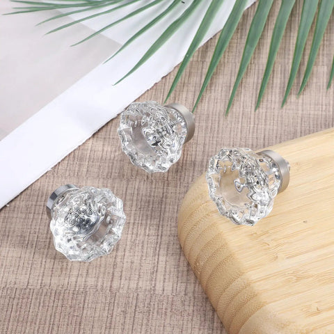 Top view of three Six Pack Crystal Cabinet Knobs With Flower Glass Handles 1.4 Inch Diameter Clear Crystal With Brushed Gold Bases