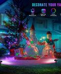 Solar Color Spotlight Lights Outdoor 35 LEDs Multicolor IP67 Waterproof 4 Pack illuminating snowmen in a yard at night