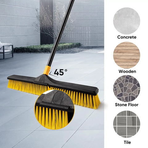 Heavy Duty 24 Inch Push Broom With Adjustable Telescoping Handle Up To 65 Inches on a floor, showing bristles at a 45° angle.