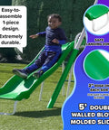 Child sliding down green 5 ft wave slide from Durable Metal Backyard Swing Set For Kids With Two Swings Roman Glider Teeter Totter And 5 Ft Wave Slide Sturdy 6 Foot Steel Frame Plus Anchor Kit Supports Up To 800 Lbs For Ages 3 To 8