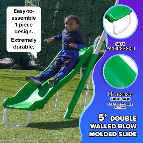 Child sliding down green 5 ft wave slide from Durable Metal Backyard Swing Set For Kids With Two Swings Roman Glider Teeter Totter And 5 Ft Wave Slide Sturdy 6 Foot Steel Frame Plus Anchor Kit Supports Up To 800 Lbs For Ages 3 To 8