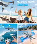 Foldable 1080P FPV Drone With Camera For Grownups, Beginners And Kids, capturing gesture selfie on beach, showing flight controls.