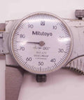 Close-up of 0-6 Inch Dial Caliper With Inside And Outside Measuring,.001 Inch Graduation, Dual Range Stainless Steel Precision Tool shown