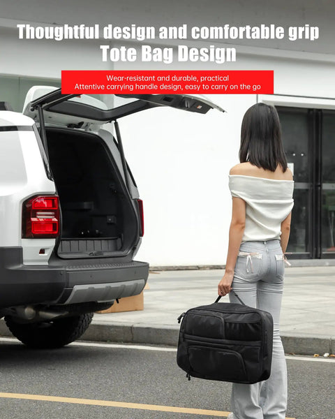 Woman holding tote bag near SUV with open trunk, showcasing durable and practical design.