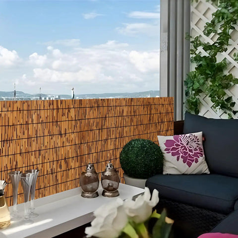 Natural Bamboo Reed Fence 6 Ft High By 16.4 Ft Long Privacy Screen for Garden Balcony Backyard Patio in outdoor setting
