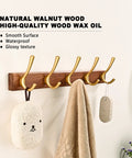 17.3 Inch Walnut Wood Coat Rack Wall Mount With Five Hooks Dope Heavy Duty Wooden Jacket Hanger shown with towels and bag