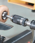Heavy Duty Five Eighth Inch Keyless Drill Chuck With MT2 Shank for wood lathe in use, showing knurled hand grip and B16 taper