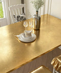 Image of Dope Gold Peel And Stick Wallpaper Thick Metallic Wallcovering covering a dining table, showcasing a sleek finish.