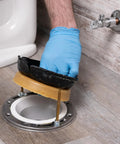 Heavy Duty Wax Bowl Ring For Toilet Installation Fits 3 Inch And 4 Inch Waste Lines, 100 Percent Petroleum Wax Gasket being installed