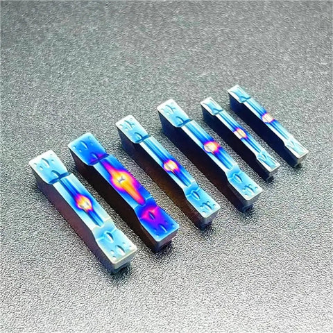 Set of 10Pcs CNC Grooving Carbide Inserts for Stainless Steel and Metal Lathe Tools Pro Grade MGMN200G KT7030 on display surface